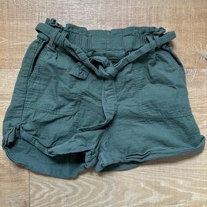 Army green cotton shorts with gathered wait and belt.